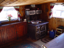 Antique cookstove in kitchen.